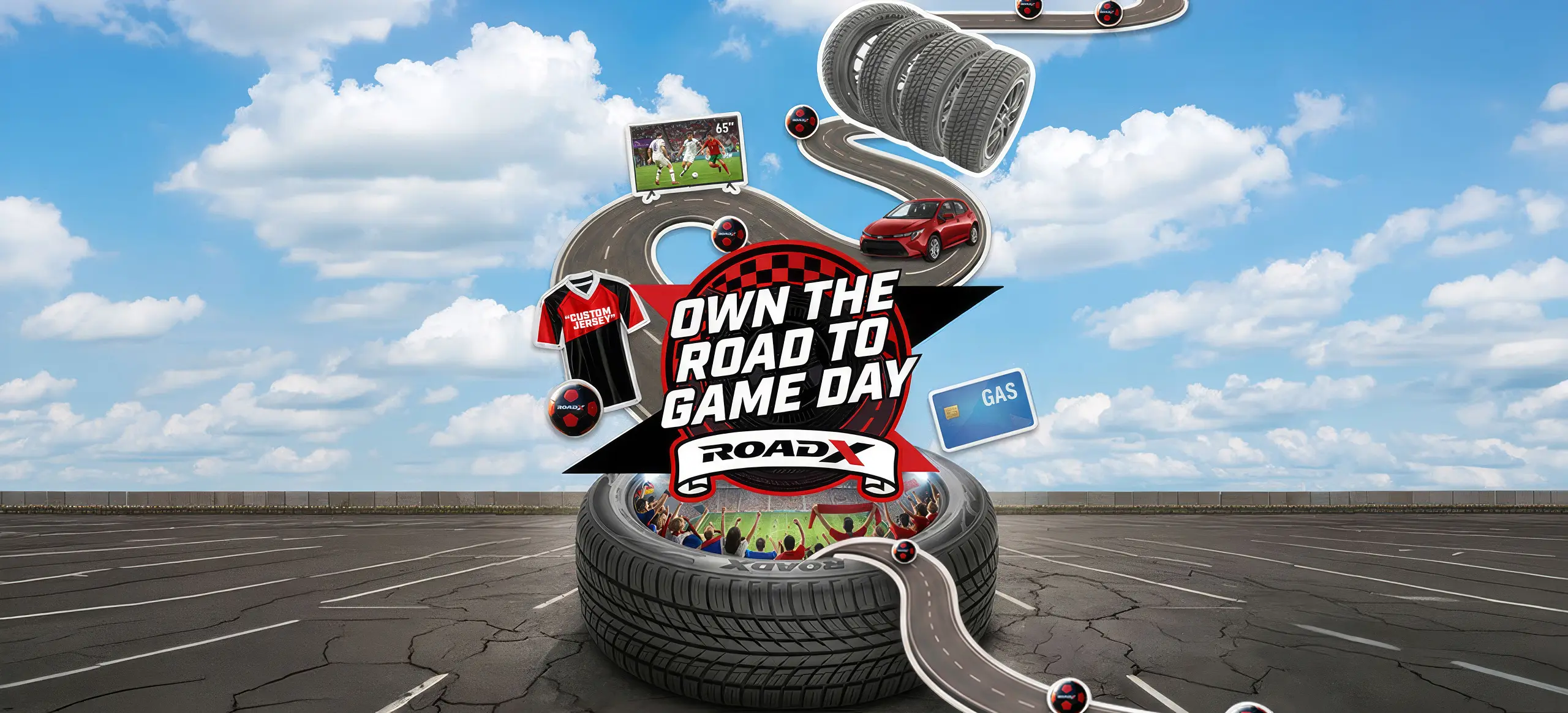 Promotional RoadX contest graphic featuring a giant tire in a parking lot under a bright blue sky with clouds. A winding road emerges from the tire and loops through various prize icons, including a television showing a soccer match, a set of tires, a red car, a gas gift card, and a sports jersey. At the center is the contest logo reading “Own the Road to Game Day,” with soccer-themed graphics and cheering fans inside the tire. The design uses a race-track motif to connect the prizes and reinforce the road-trip theme.